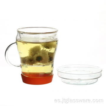 Taza de té de vidrio soplada a mano con hojas de té sueltas con tapa de vidrio